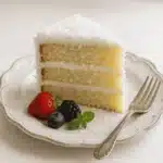 Easy Coconut Cake Recipe That Will Surprise Your Guests 6 Coconut cake recipe served with garnish
